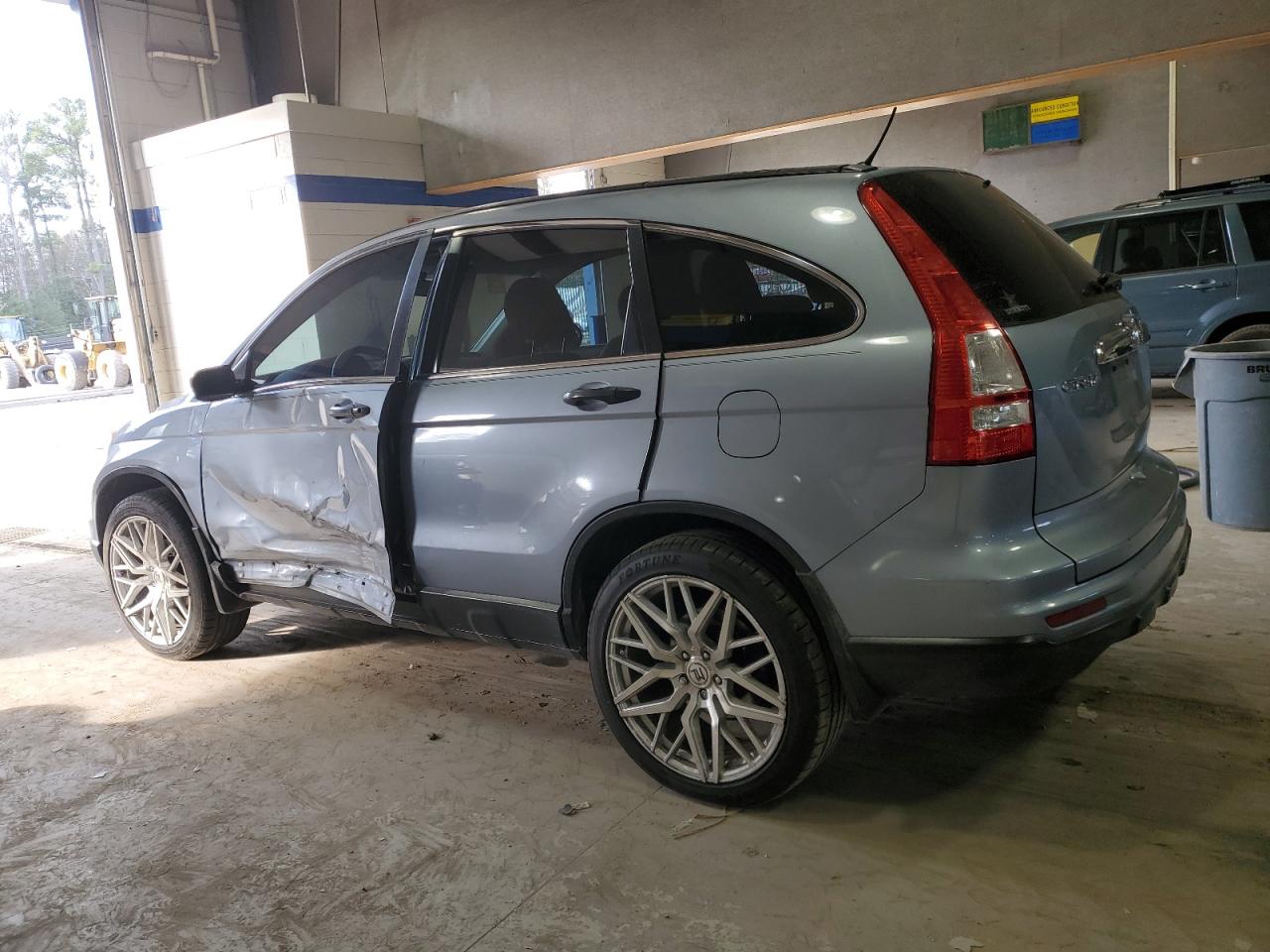 2010 Honda CR-V VIN 3CZRE4H51AG707020 Copart auction photo, side damage thumbnail 2