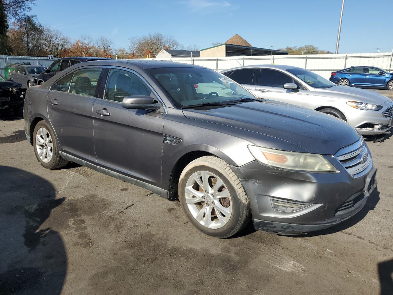 2011 Ford Taurus VIN 1FAHP2EW4BG113666 Copart auction photo, side damage thumbnail 4