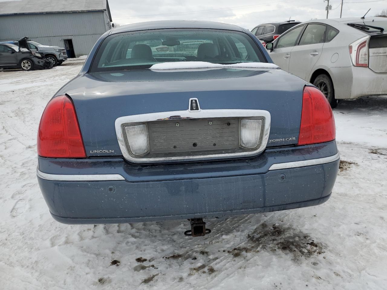 2005 Lincoln Town Car VIN 1LNHM82W35Y634883 Copart auction photo, front end / minor dent/scratches damage thumbnail 6