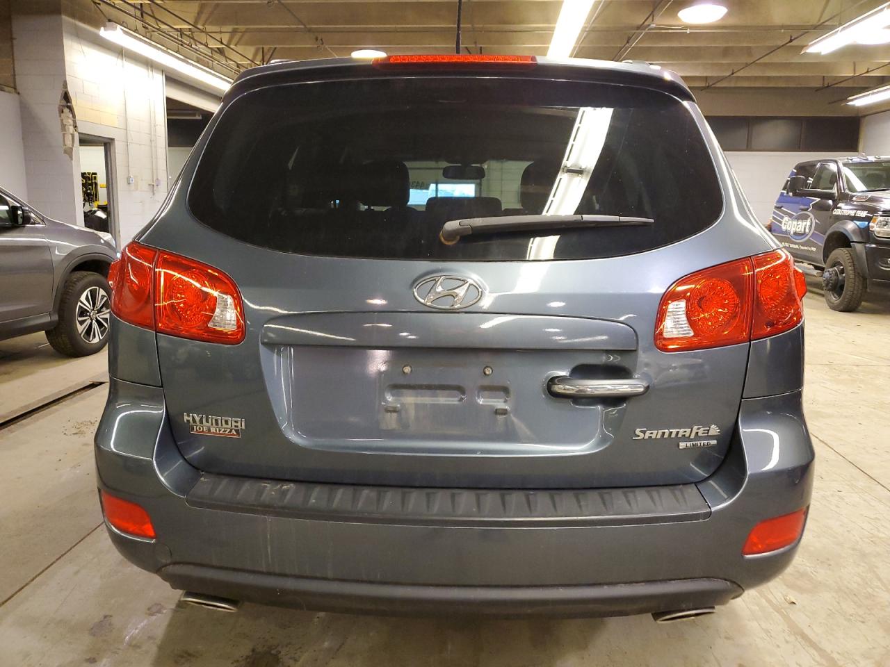 2009 Hyundai Santa Fe VIN 5NMSH13EX9H331423 Copart auction photo, minor dent/scratches damage thumbnail 6