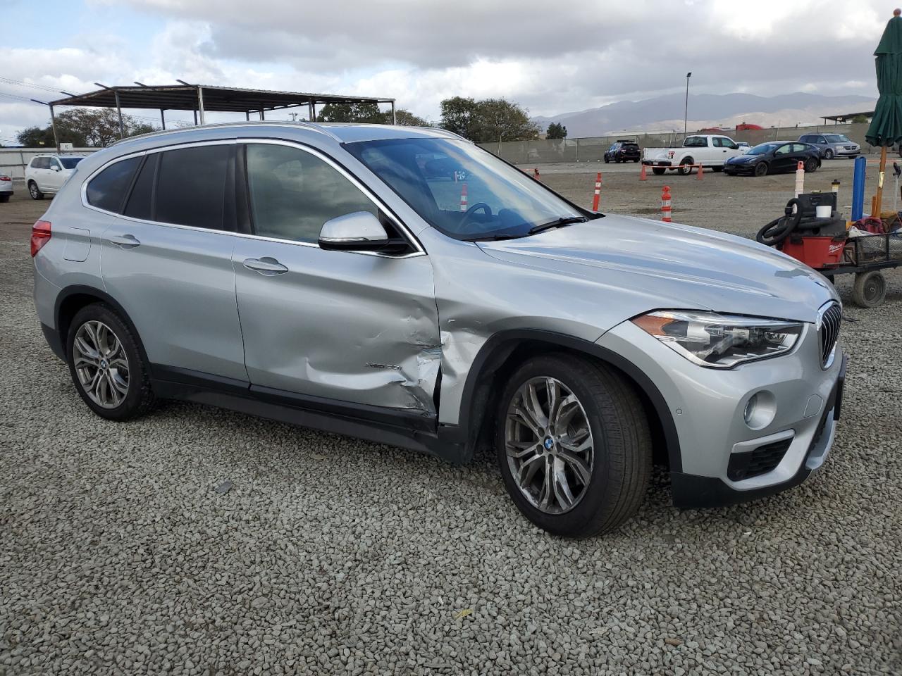 2016 BMW X1 VIN WBXHT3Z38G4A49366 Copart auction photo, front end / side damage thumbnail 4