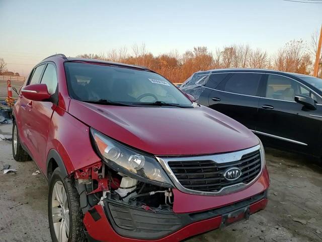 2011 KIA Sportage VIN KNDPBCA24B7062747 Copart auction photo, front end / side damage thumbnail 10