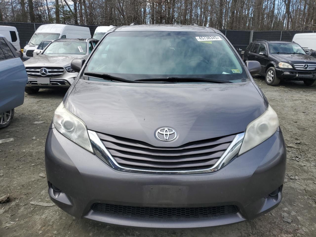 2015 Toyota Sienna VIN 5TDKK3DC8FS572366 Copart auction photo, rear end damage thumbnail 5