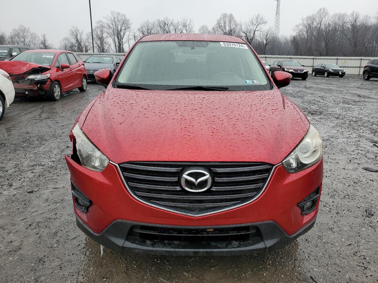 2016 Mazda CX-5 VIN JM3KE4CY4G0743569 Copart auction photo, front end / side damage thumbnail 5