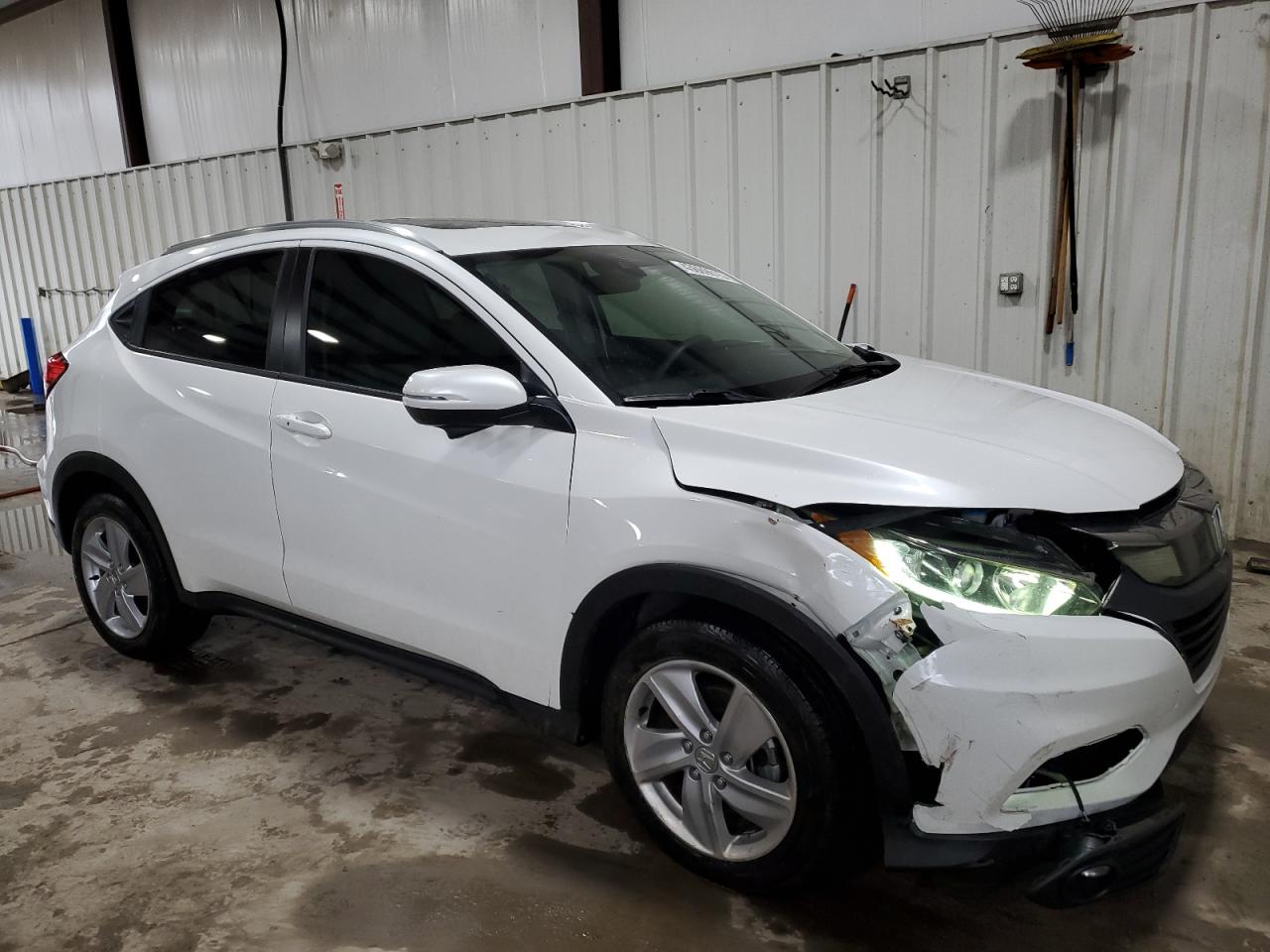 2019 Honda HR-V VIN 3CZRU5H58KM715028 Copart auction photo, front end / side damage thumbnail 4