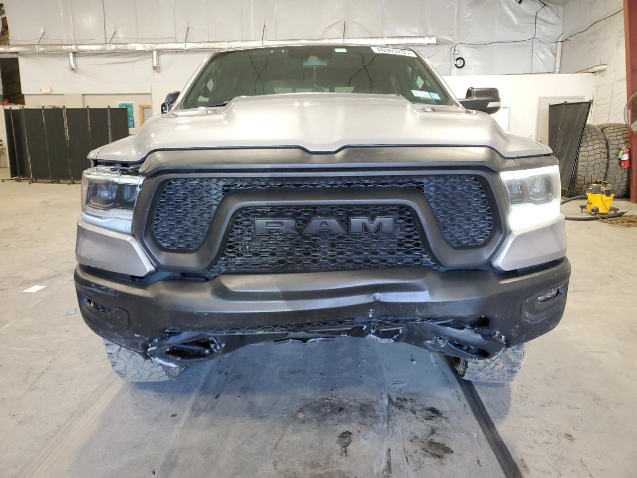 2021 RAM 1500 VIN 1C6SRFLT8MN655627 Copart auction photo, undercarriage / all over damage thumbnail 5
