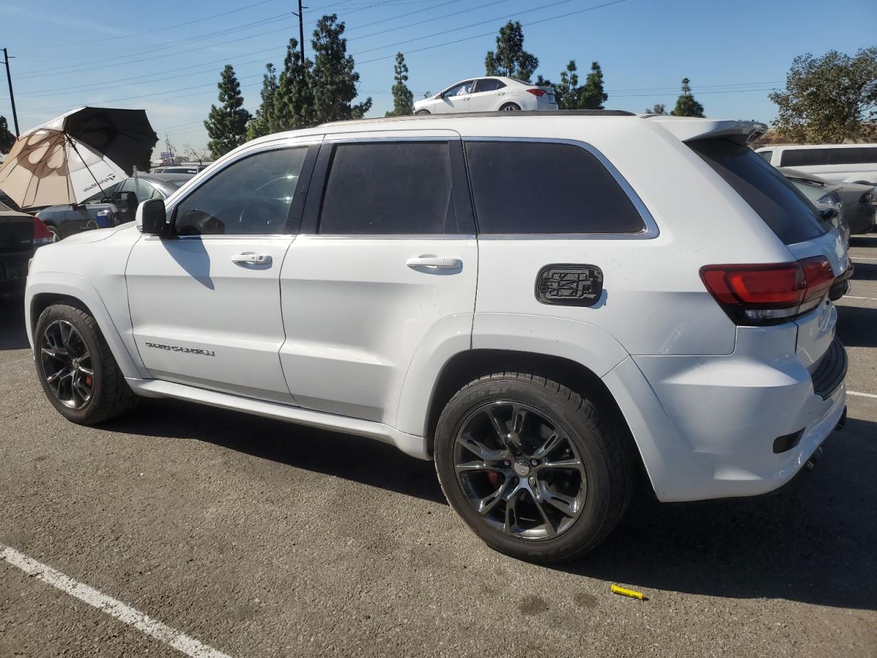 2014 Jeep Grand Cherokee VIN 1C4RJFDJ2EC237072 Copart auction photo, vandalism damage thumbnail 2