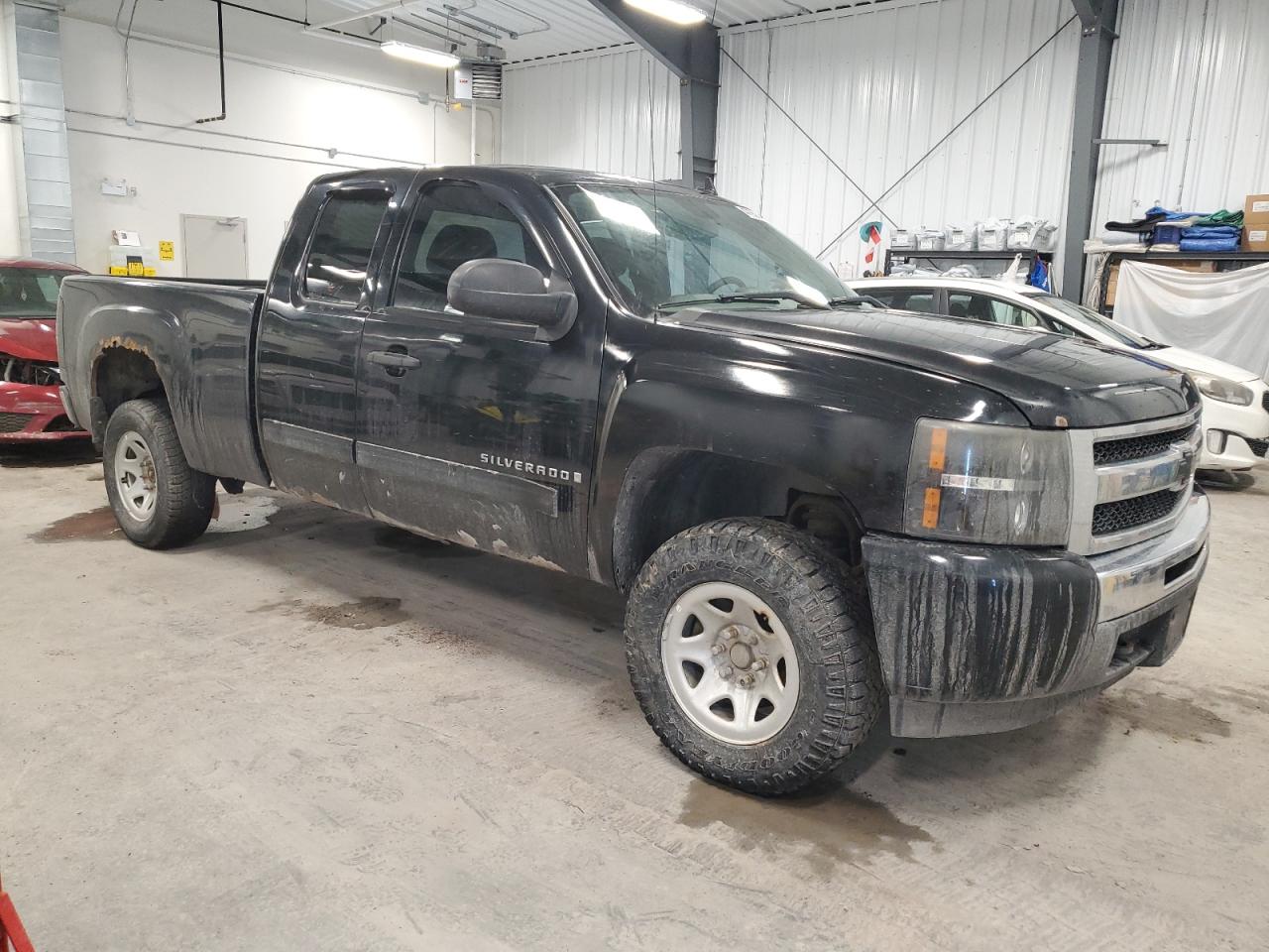 2009 Chevrolet Silverado VIN 1GCEK19CX9Z168837 Copart auction photo, side / front end damage thumbnail 4