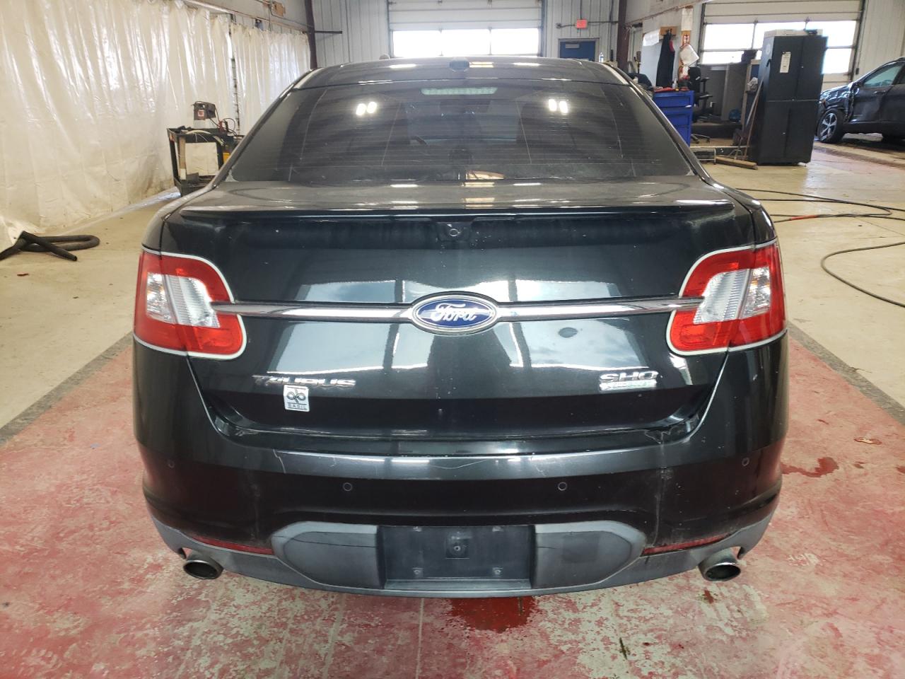 2011 Ford Taurus VIN 1FAHP2KT6BG101335 Copart auction photo, water/flood damage thumbnail 6