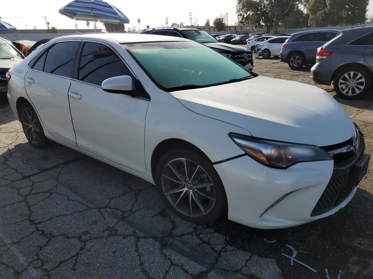 2015 Toyota Camry VIN 4T1BF1FKXFU057745 Copart auction photo, front end / minor dent/scratches damage thumbnail 4