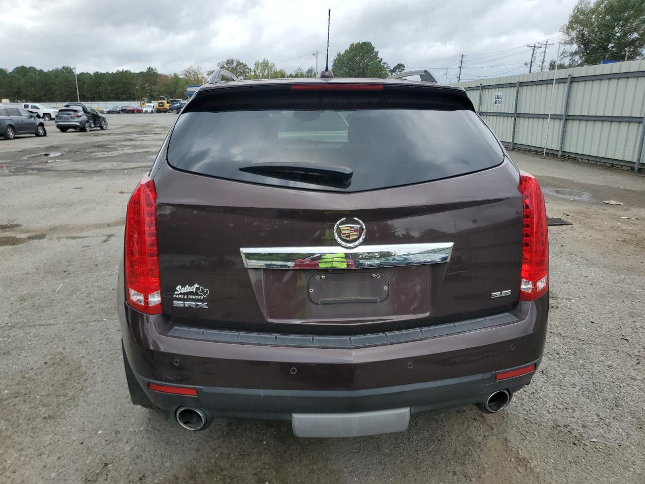 2015 Cadillac SRX VIN 3GYFNCE33FS571798 Copart auction photo, front end / minor dent/scratches damage thumbnail 6