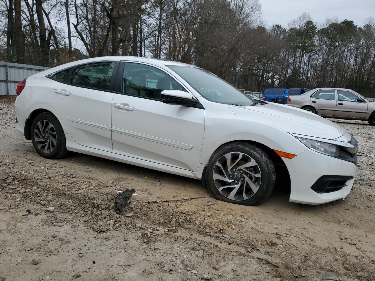 2017 Honda Civic VIN 19XFC2F79HE069645 Copart auction photo, front end / undercarriage damage thumbnail 4