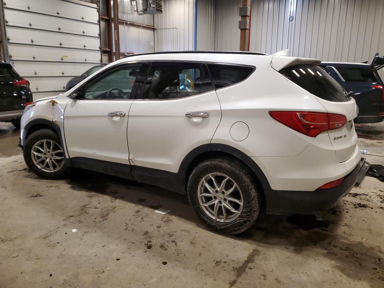2014 Hyundai Santa Fe VIN 5XYZU3LB0EG156633 Copart auction photo, front end / all over damage thumbnail 2