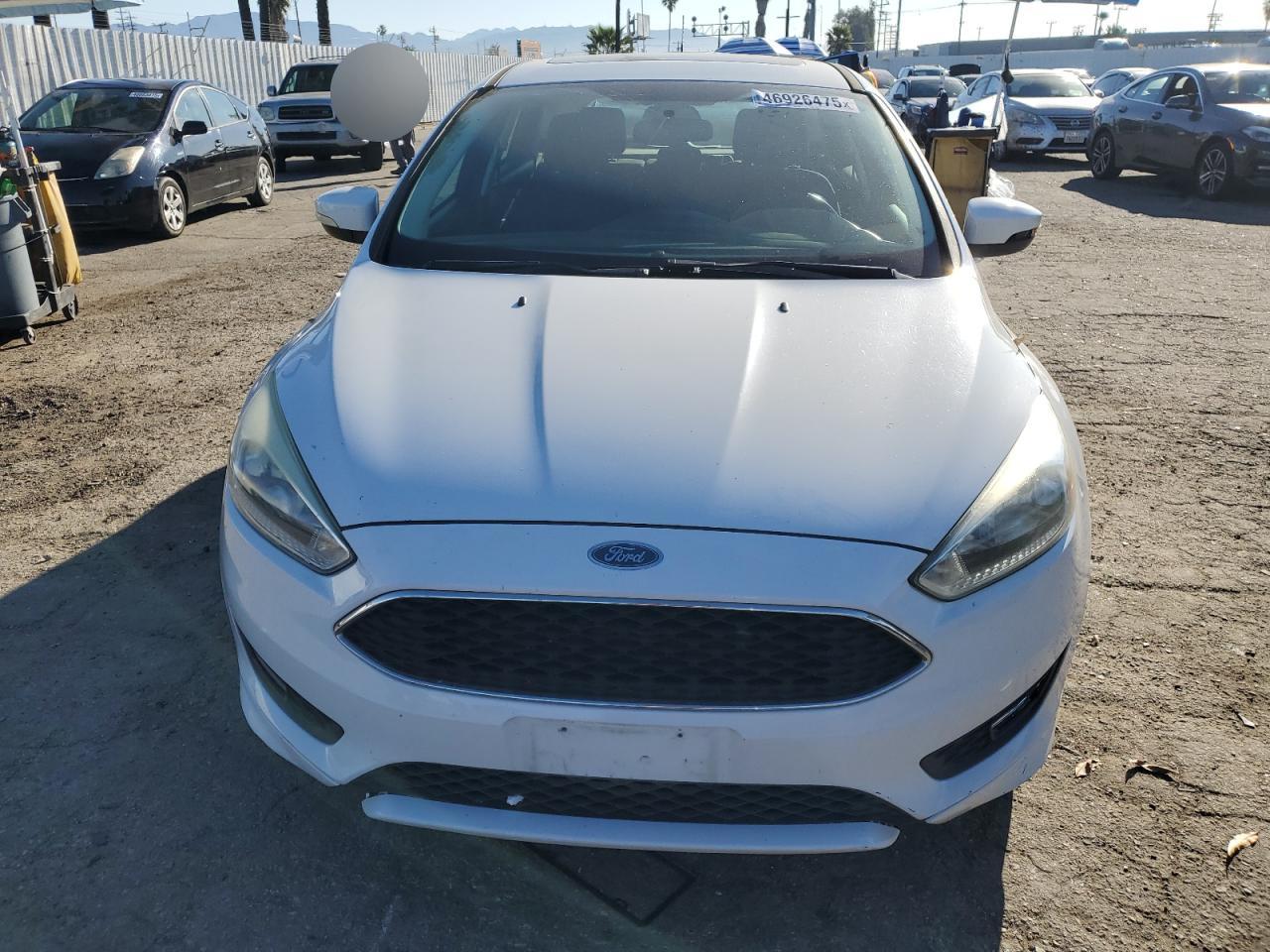 2015 Ford Focus VIN 1FADP3K29FL334599 Copart auction photo, rear end damage thumbnail 5