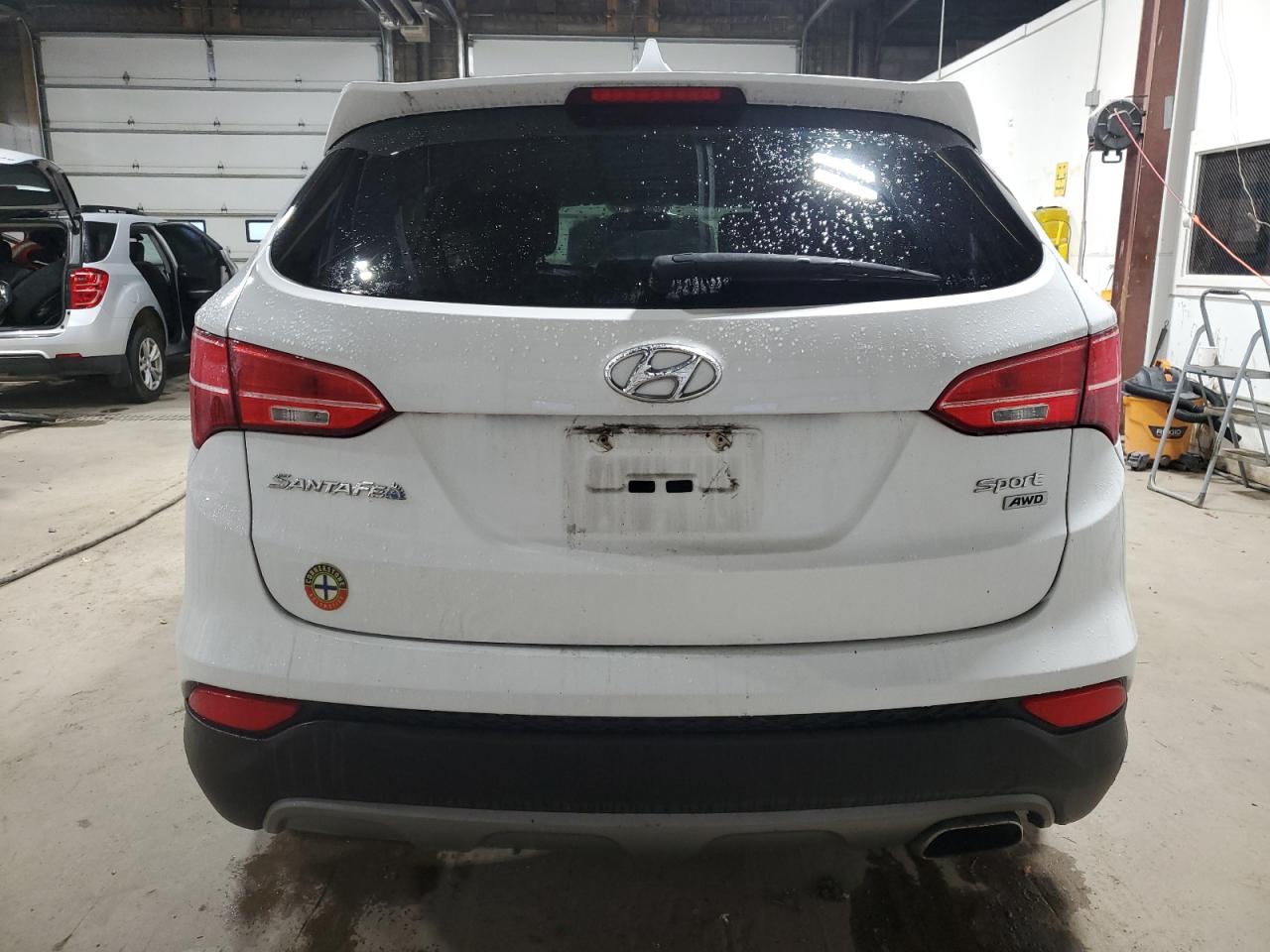 2016 Hyundai Santa Fe VIN 5XYZTDLB7GG317894 Copart auction photo, vandalism / undercarriage damage thumbnail 6