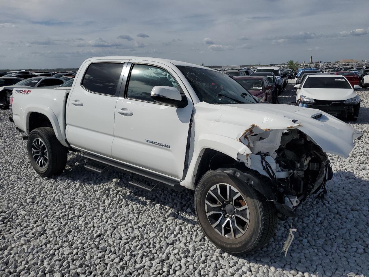 2020 Toyota Tacoma VIN 3TMCZ5AN0LM312170 Copart auction photo, front end / hail damage thumbnail 4