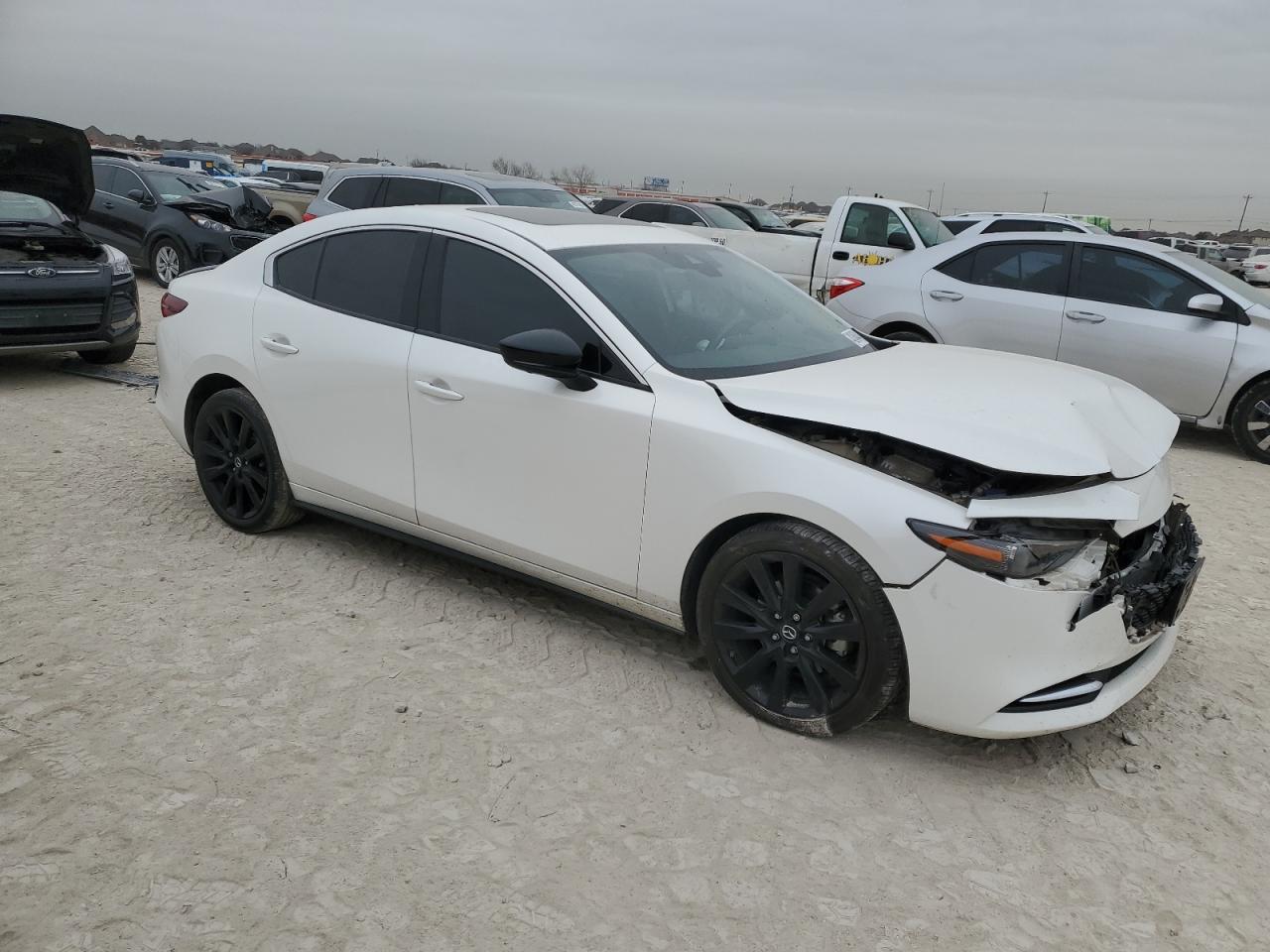 2021 Mazda 3 VIN JM1BPBEY4M1311591 Copart auction photo, front end / mechanical damage thumbnail 4