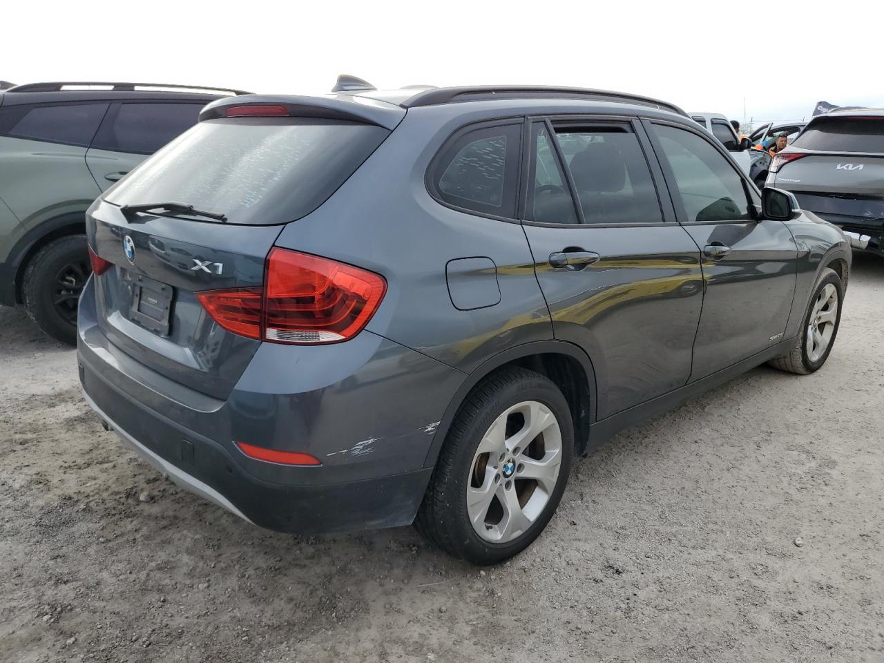 2015 BMW X1 VIN WBAVM1C51FV318189 Copart auction photo, water/flood damage thumbnail 3