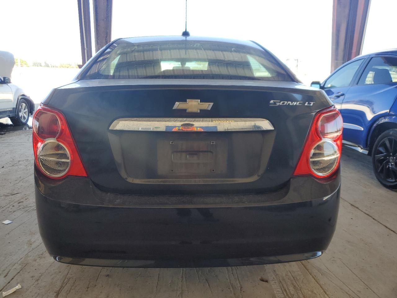 2015 Chevrolet Sonic VIN 1G1JC5SH0F4205355 Copart auction photo, minor dent/scratches damage thumbnail 6
