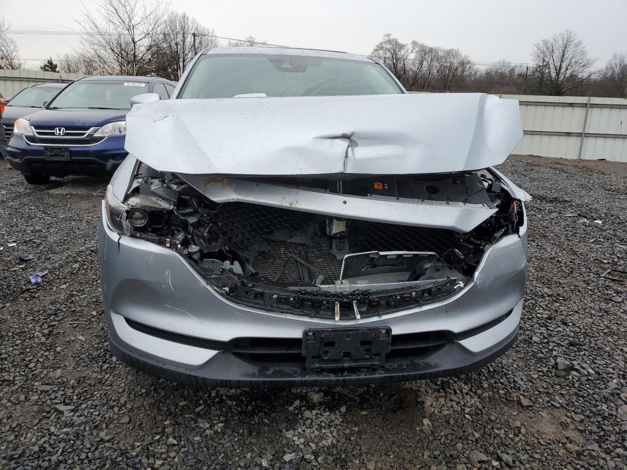 2018 Mazda CX-5 VIN JM3KFBCM9J0438171 Copart auction photo, front end / side damage thumbnail 5