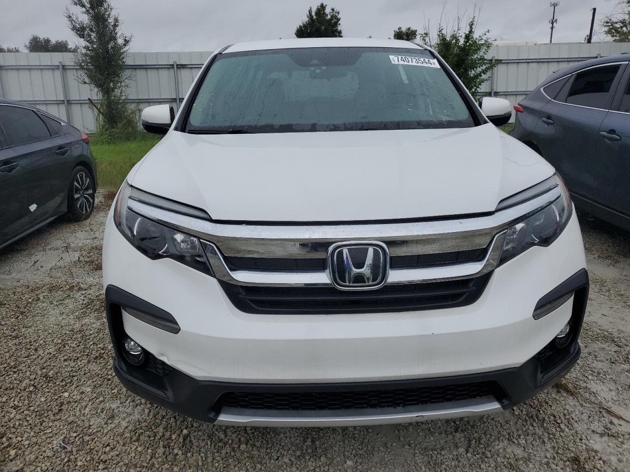 2020 Honda Pilot VIN 5FNYF5H35LB024507 Copart auction photo, water/flood damage thumbnail 5