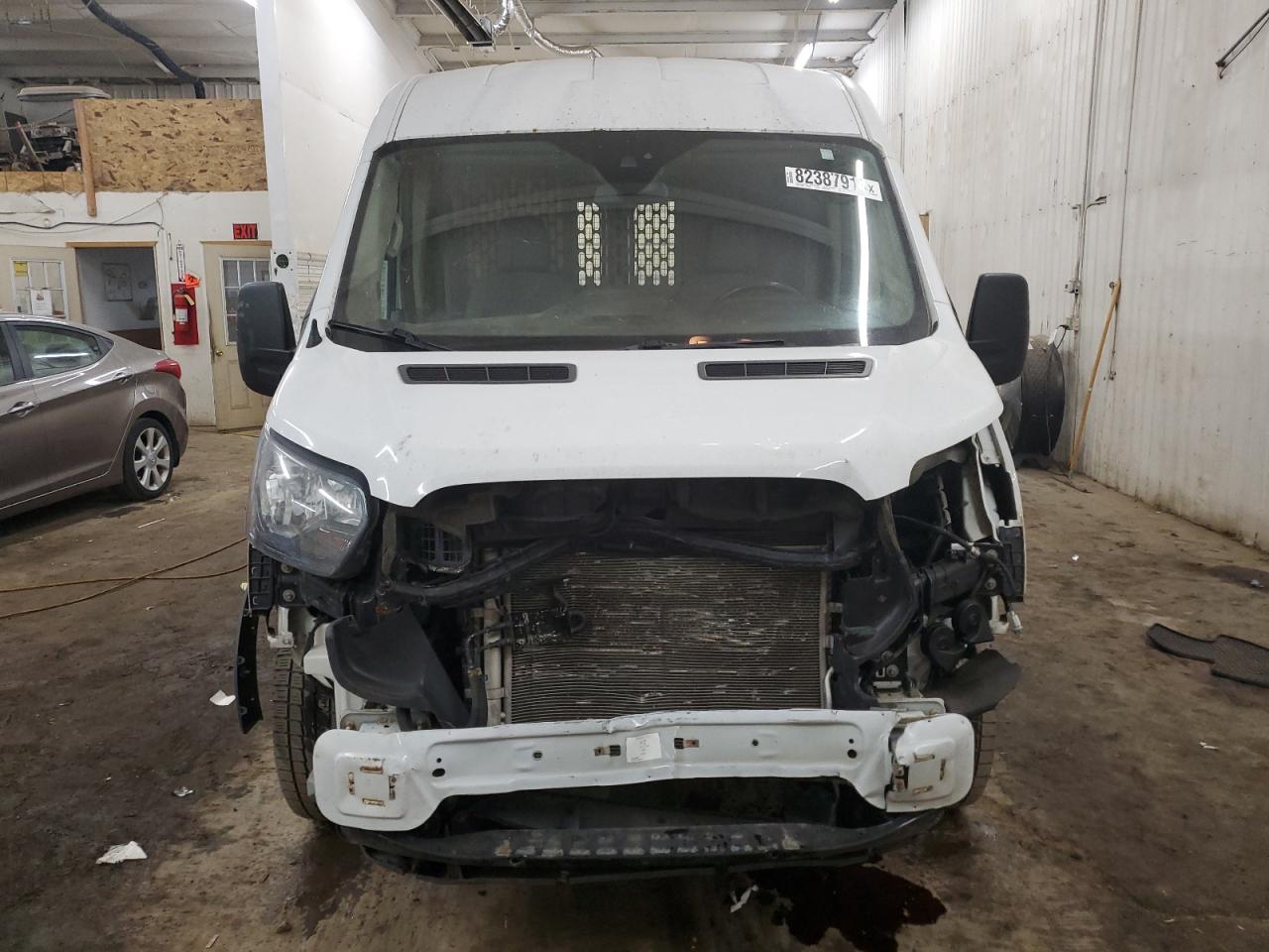 2015 Ford Transit VIN 1FTNR2CM7FKA81713 Copart auction photo, front end damage thumbnail 5