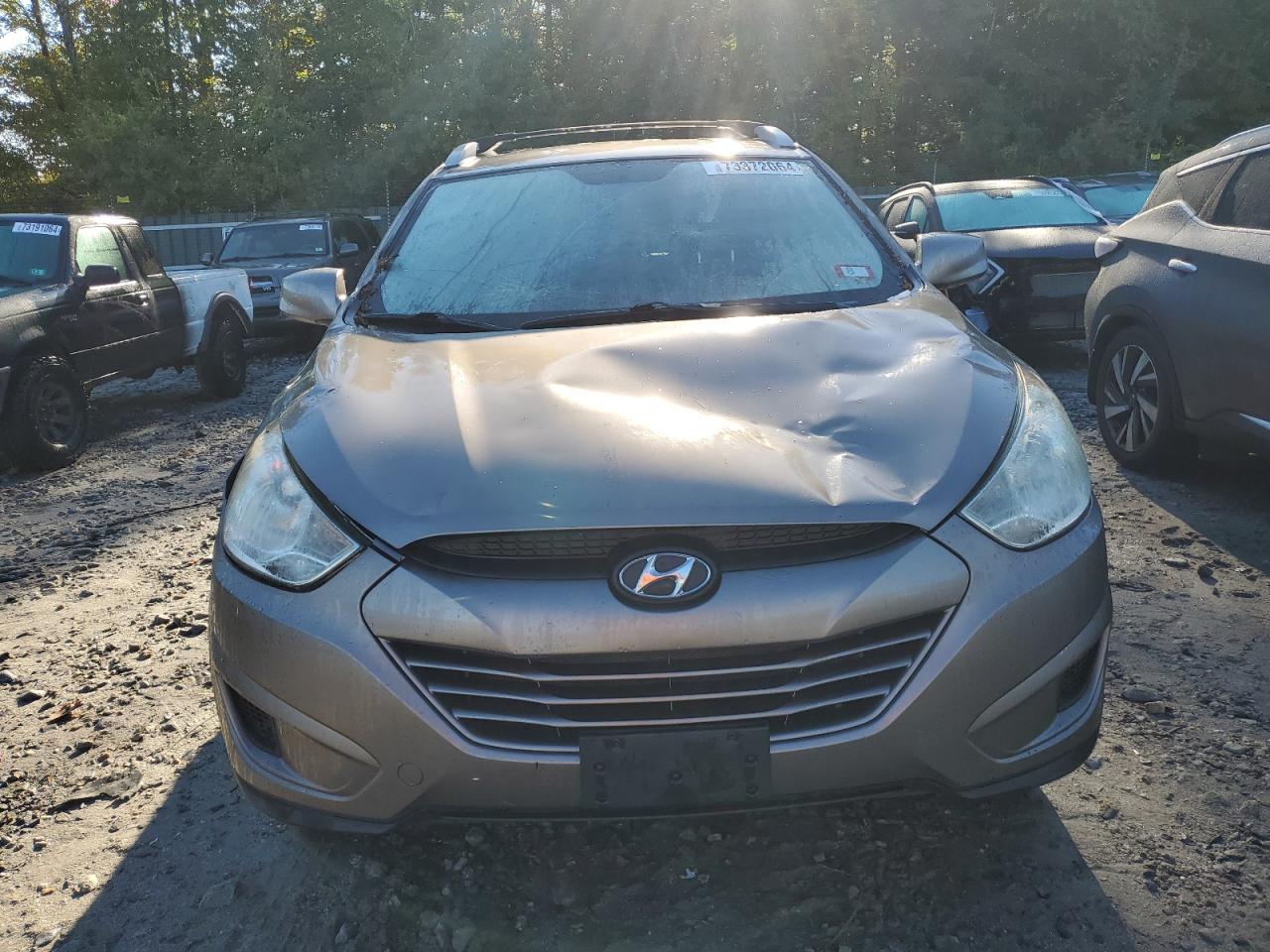 2010 Hyundai Tucson VIN KM8JUCAC3AU075154 Copart auction photo, front end / minor dent/scratches damage thumbnail 5