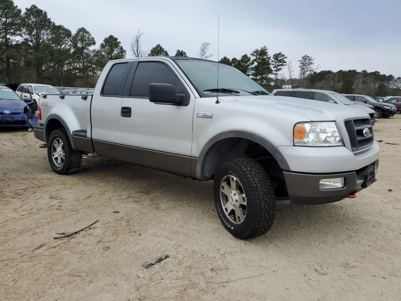2005 Ford F-150 VIN 1FTPX04565KC60916 Copart auction photo, rear end damage thumbnail 4
