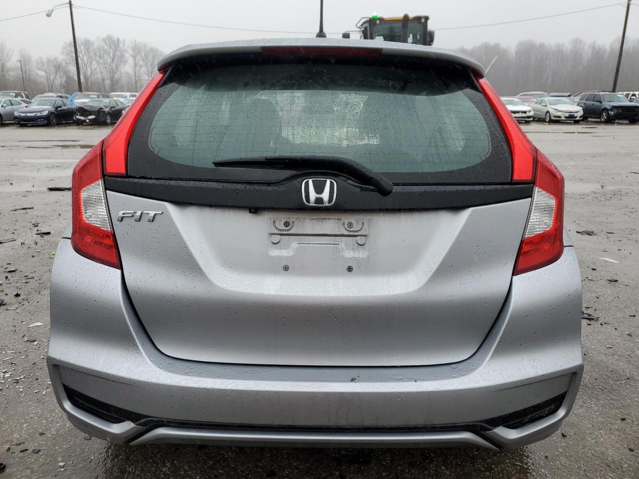 2019 Honda Fit VIN 3HGGK5H43KM750801 Copart auction photo, side / front end damage thumbnail 6