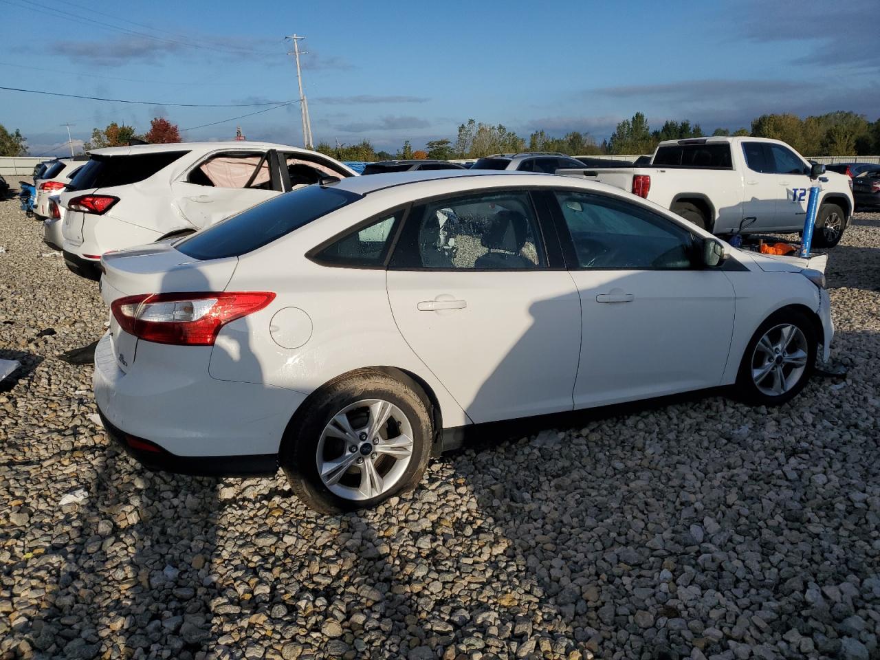 2014 Ford Focus VIN 1FADP3F24EL459678 Copart auction photo, side / front end damage thumbnail 3