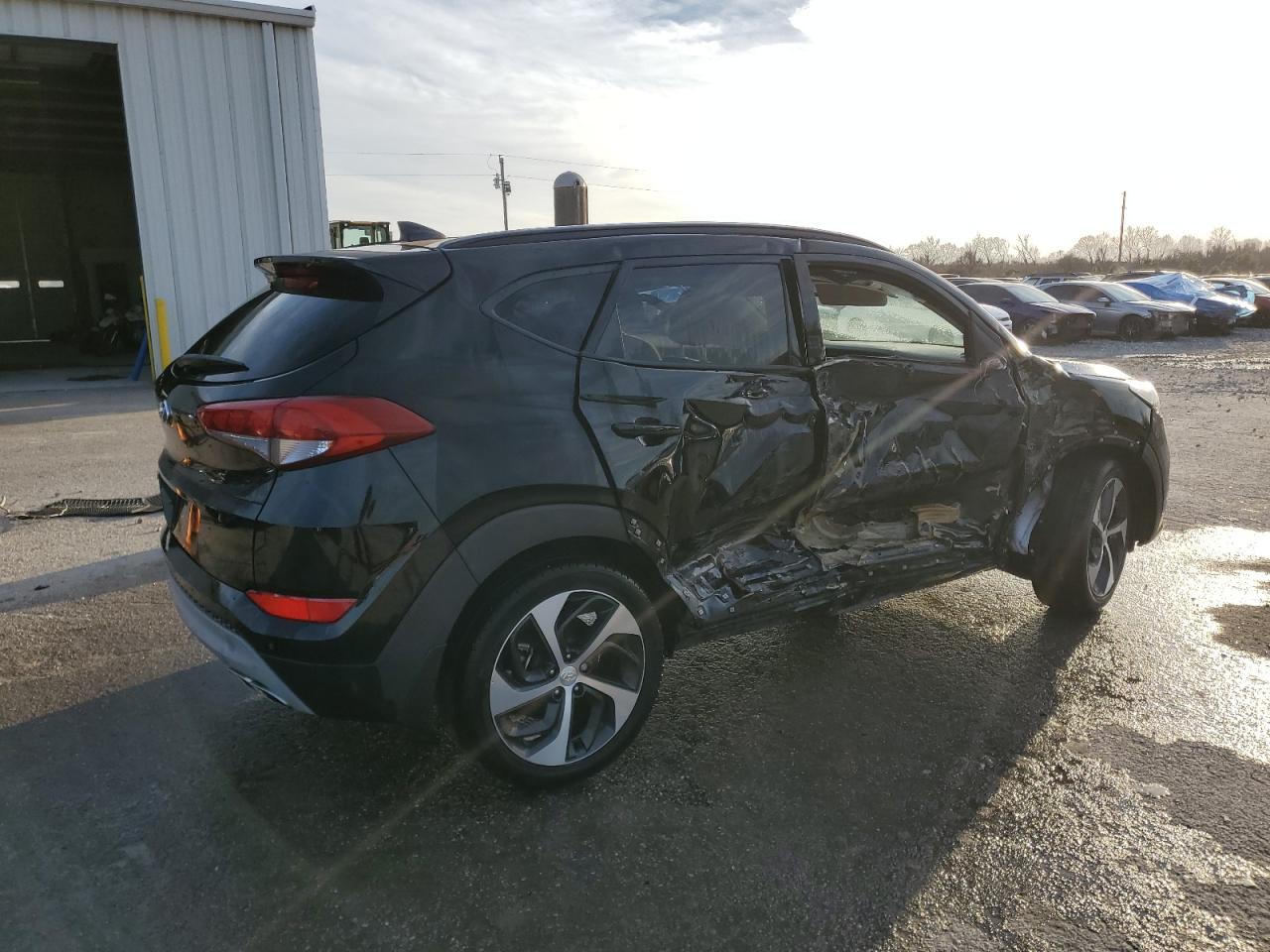 2018 Hyundai Tucson VIN KM8J33A21JU769660 Copart auction photo, side damage thumbnail 3