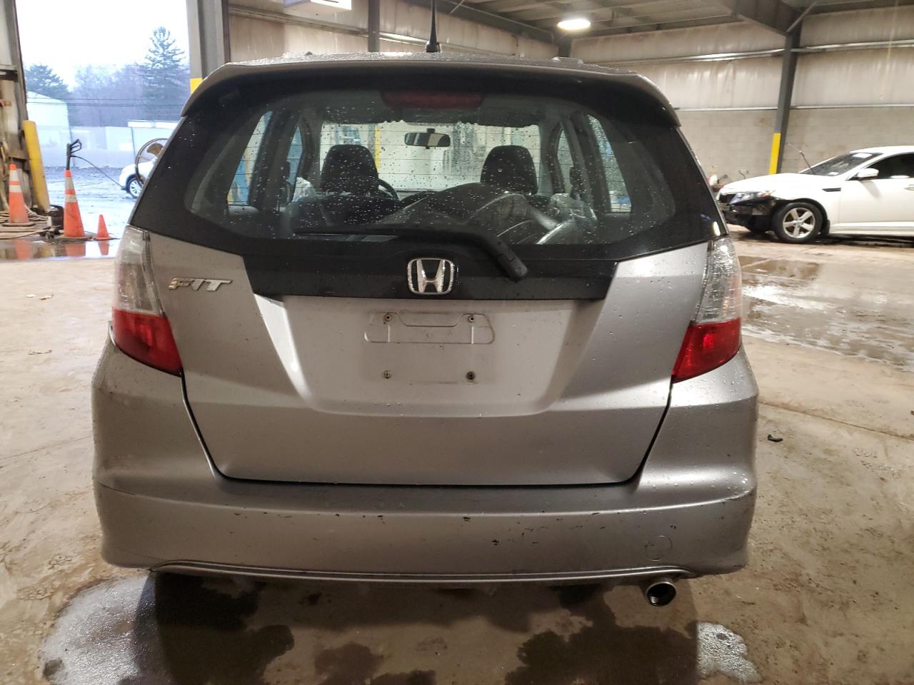 2010 Honda Fit VIN JHMGE8H49AS022461 Copart auction photo, front end / side damage thumbnail 6