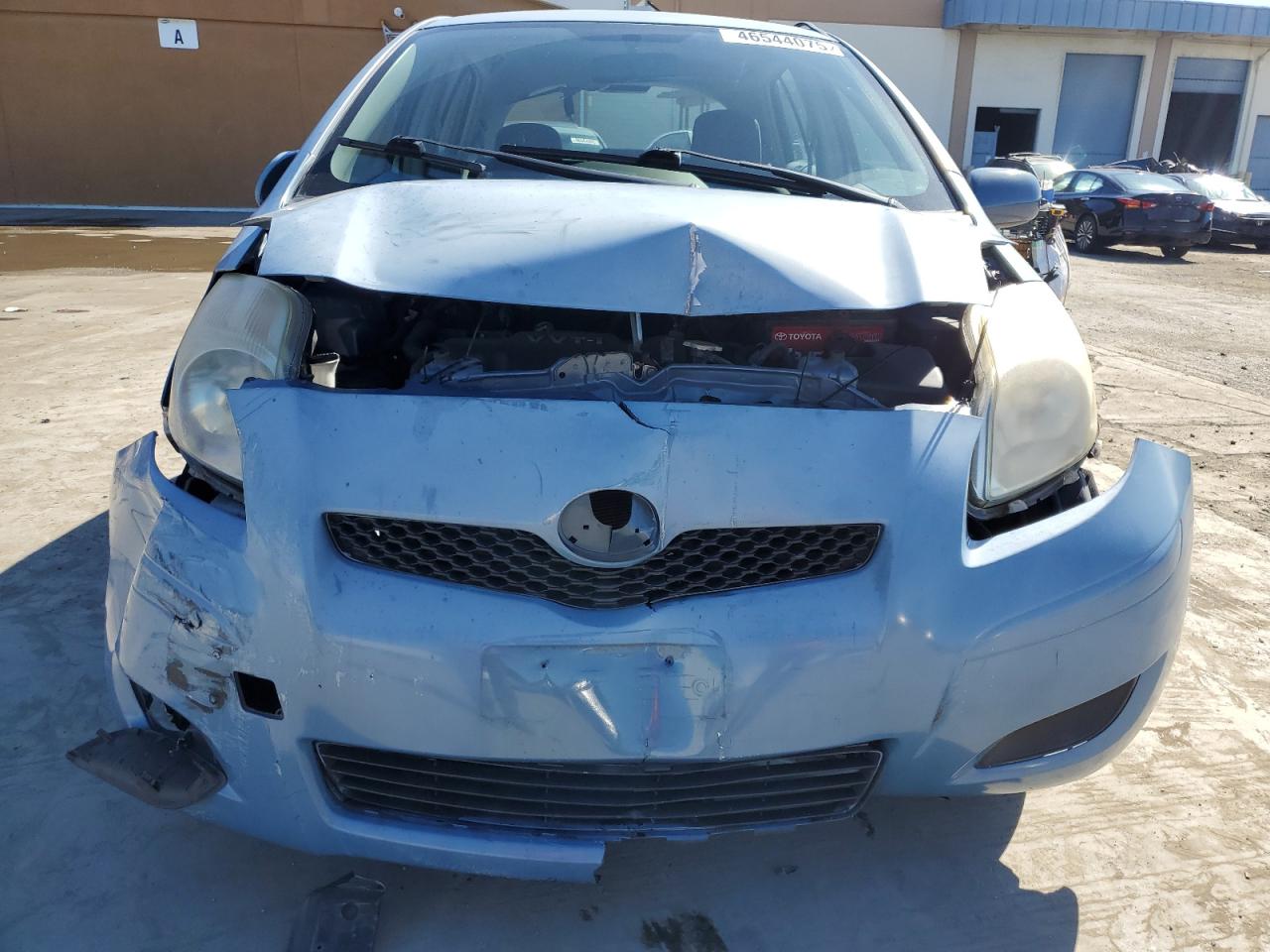 2010 Toyota Yaris VIN JTDKT4K39A5280617 Copart auction photo, front end damage thumbnail 5