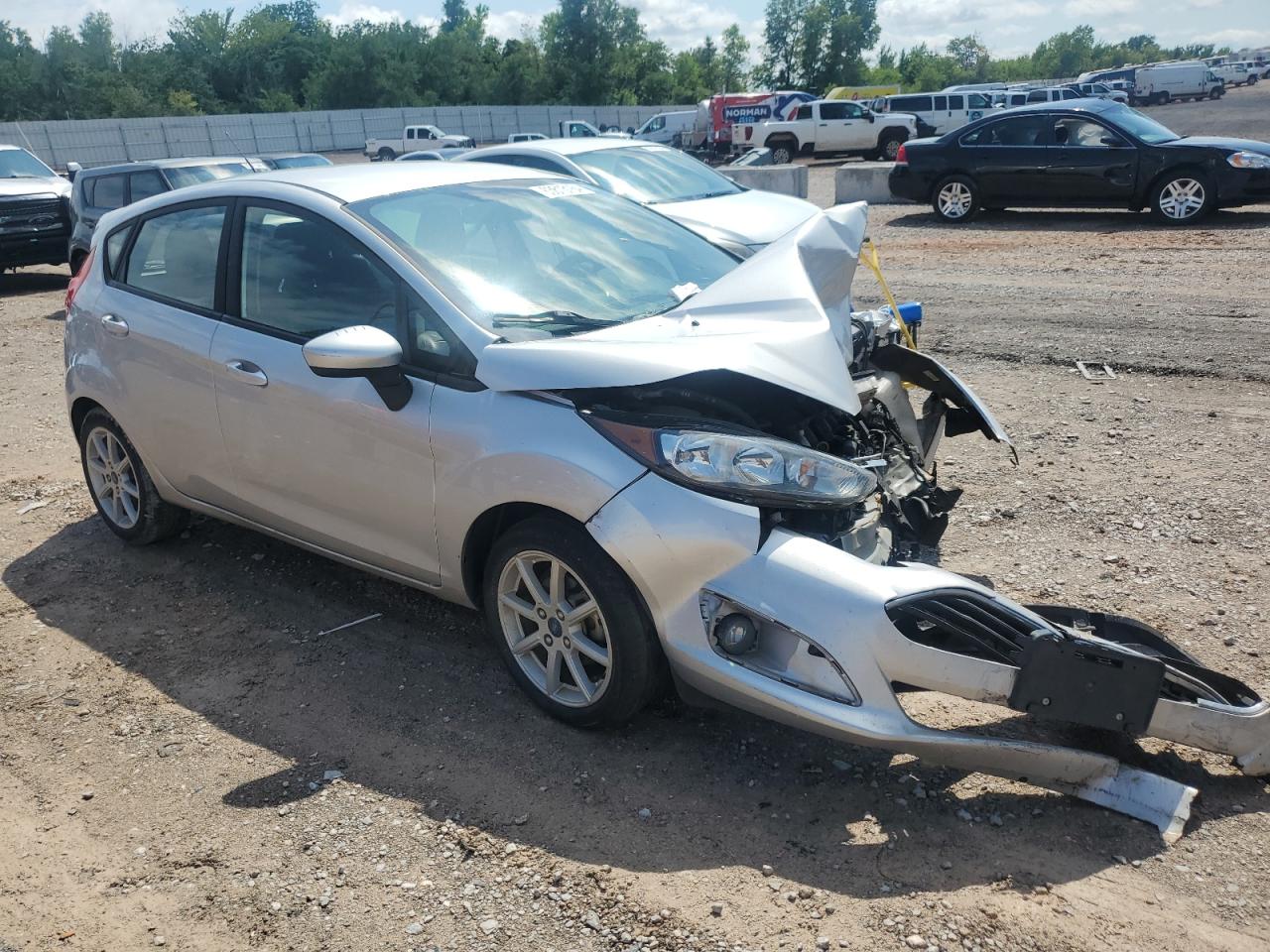 2019 Ford Fiesta VIN 3FADP4EJ4KM123456 Copart auction photo, front end / side damage thumbnail 4