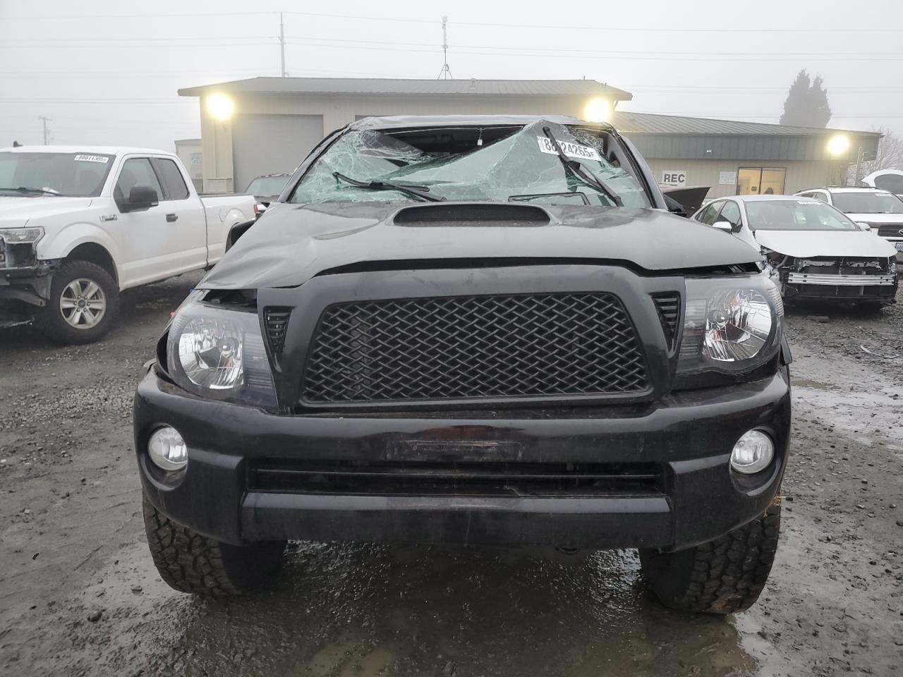 2011 Toyota Tacoma VIN 3TMLU4ENXBM057822 Copart auction photo, all over damage thumbnail 5