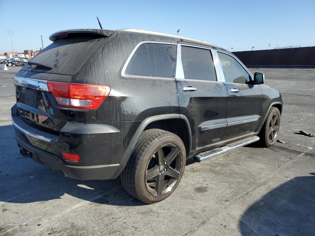 2011 Jeep Grand Cherokee VIN 1J4RS6GT9BC601794 Copart auction photo, vandalism / minor dent/scratches damage thumbnail 3