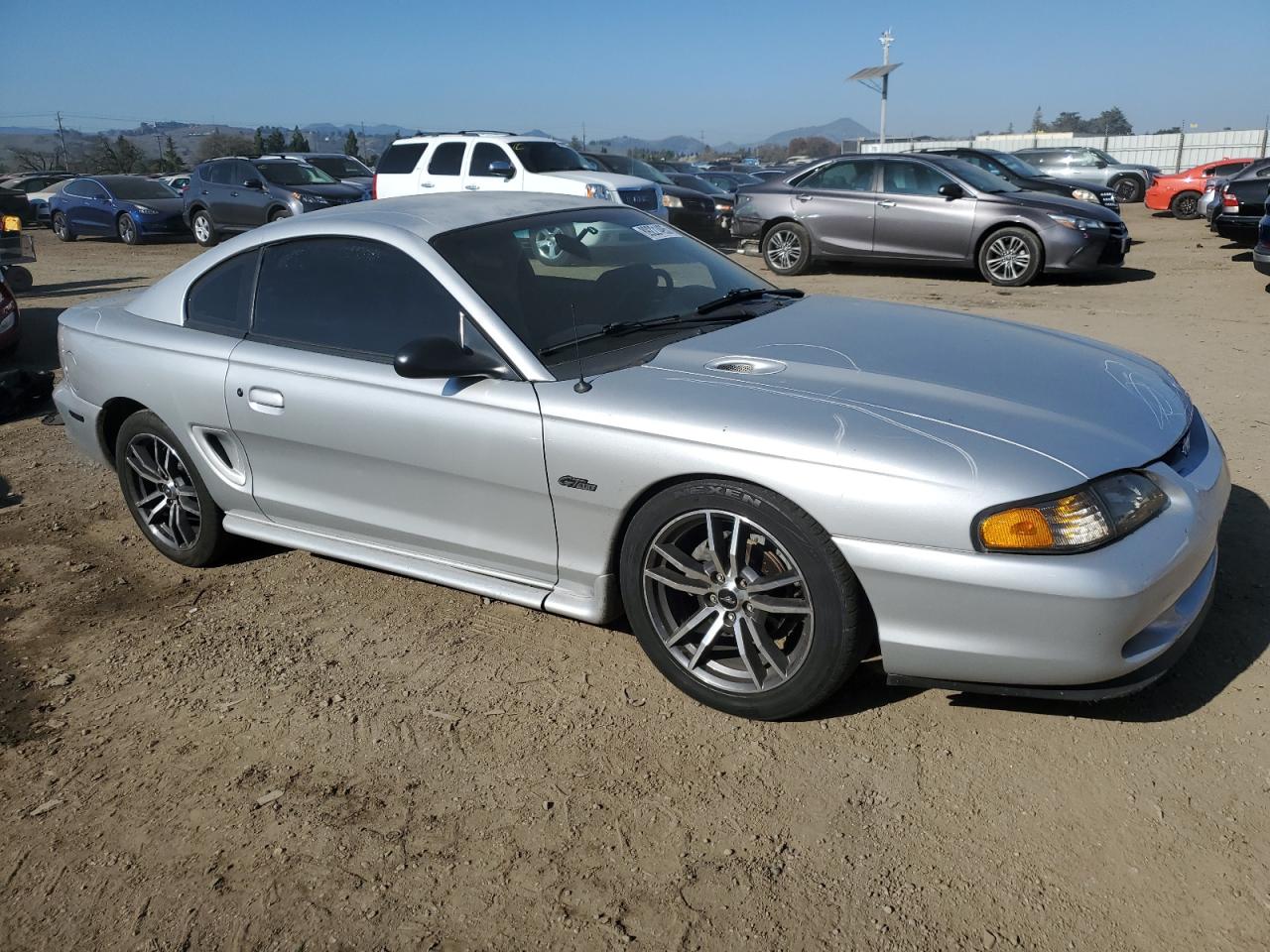 1998 Ford Mustang VIN 1FAFP42X0WF174797 Copart auction photo, vandalism damage thumbnail 4