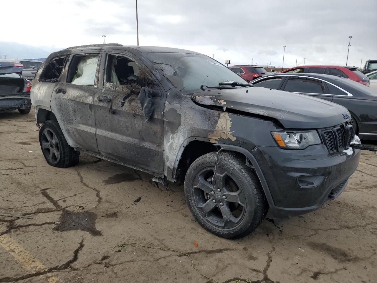 2019 Jeep Grand Cherokee VIN 1C4RJFAG1KC787643 Copart auction photo, burn damage thumbnail 4