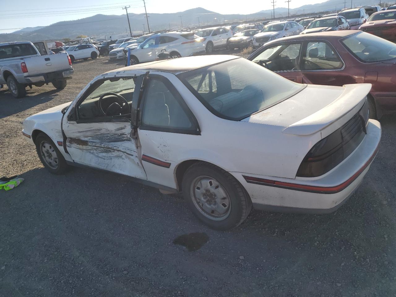 1990 Chevrolet Beretta VIN 1G1LW14T1LE136918 Copart auction photo, side damage thumbnail 2