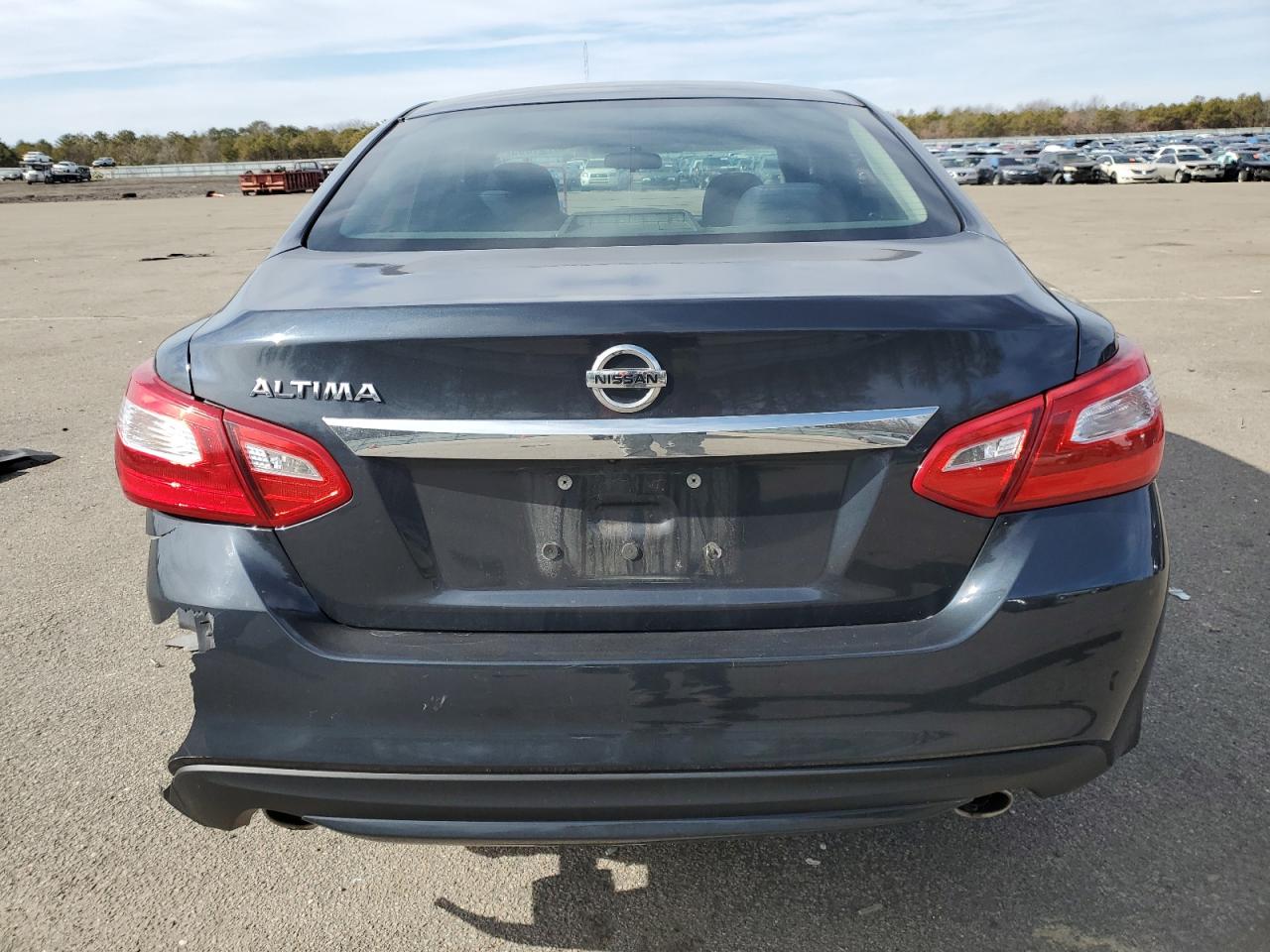 2017 Nissan Altima VIN 1N4AL3AP7HC293498 Copart auction photo, rear end / minor dent/scratches damage thumbnail 6