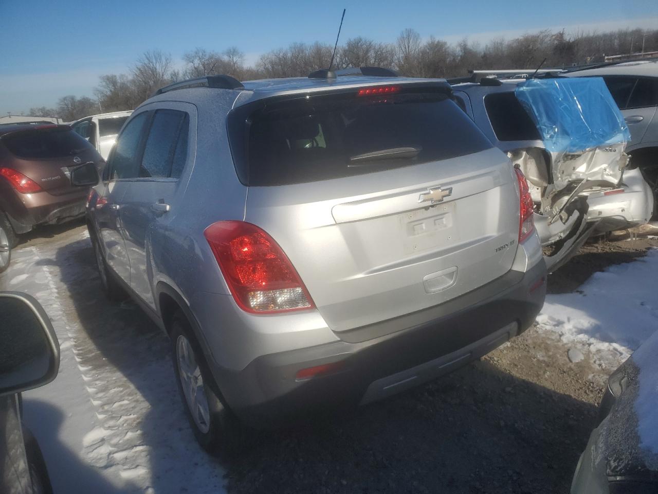 2015 Chevrolet Trax VIN 3GNCJLSB2FL246318 Copart auction photo, side damage thumbnail 2