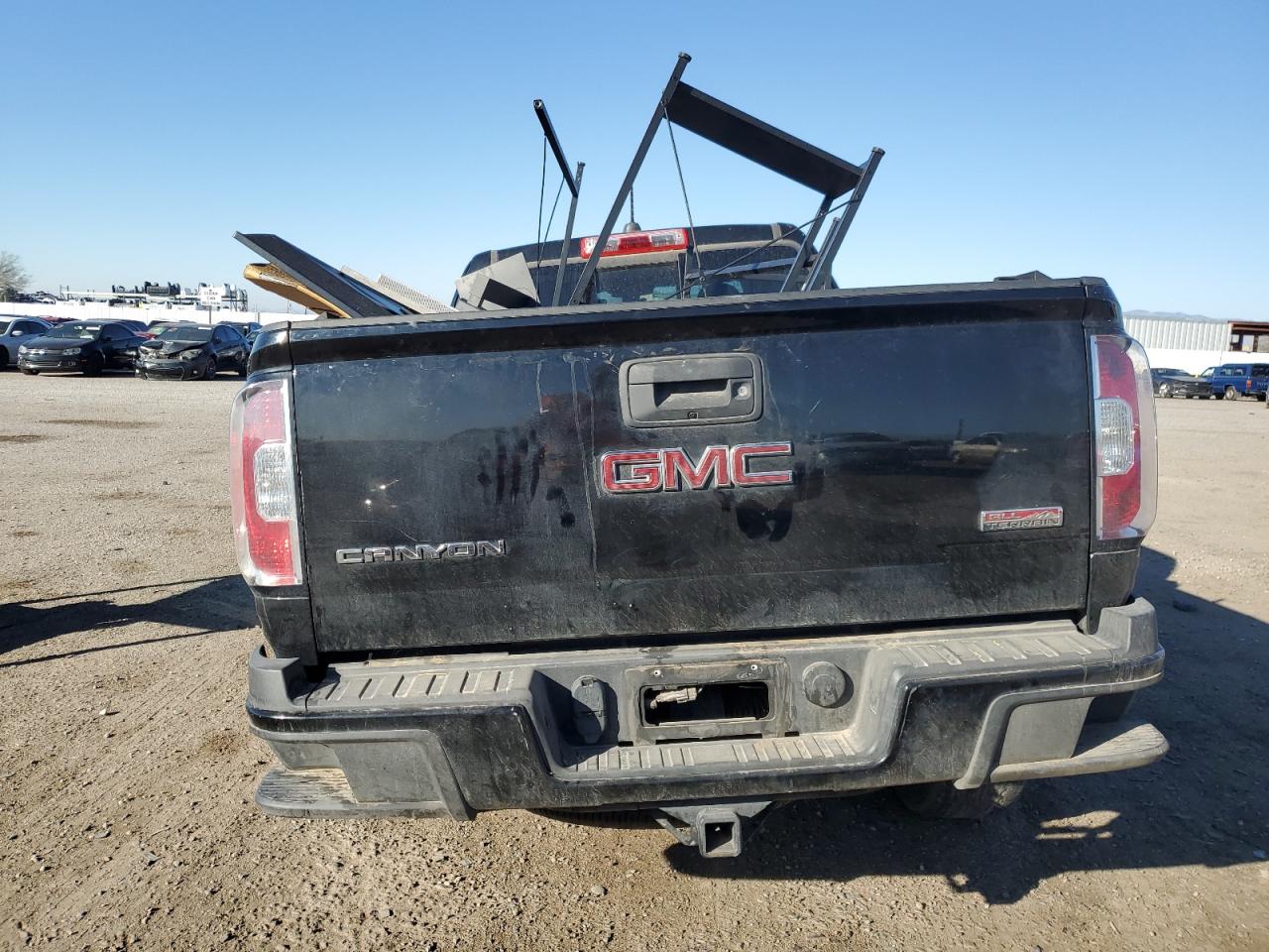 2016 GMC Canyon VIN 1GTH6CE33G1107926 Copart auction photo, all over damage thumbnail 6
