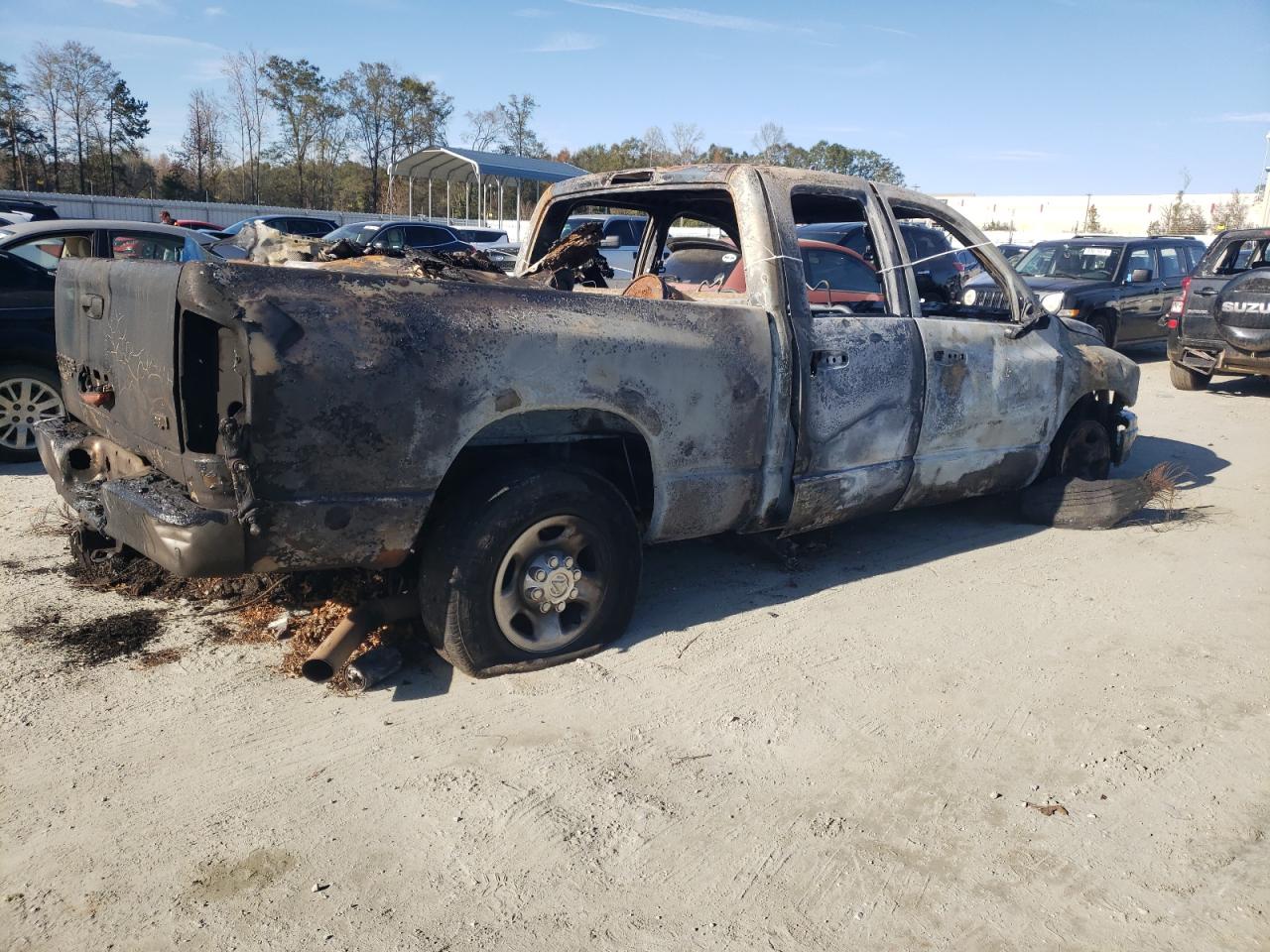 2005 Dodge RAM VIN 3D7KS28C55G865858 Copart auction photo, burn damage thumbnail 3
