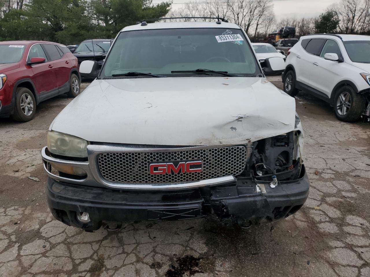 2004 GMC Yukon VIN 1GKFK66UX4J132740 Copart auction photo, all over damage thumbnail 5