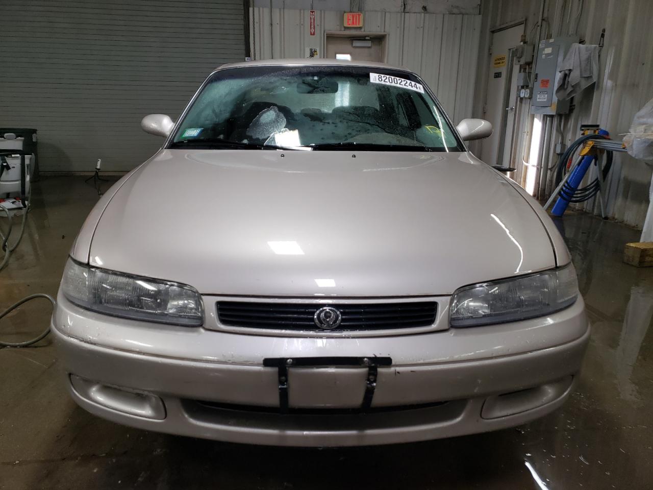 1993 Mazda 626 VIN 1YVGE22A5P5244672 Copart auction photo, side damage thumbnail 5