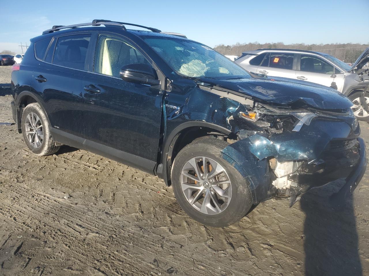 2018 Toyota RAV 4 VIN JTMRJREV9JD235794 Copart auction photo, front end damage thumbnail 4