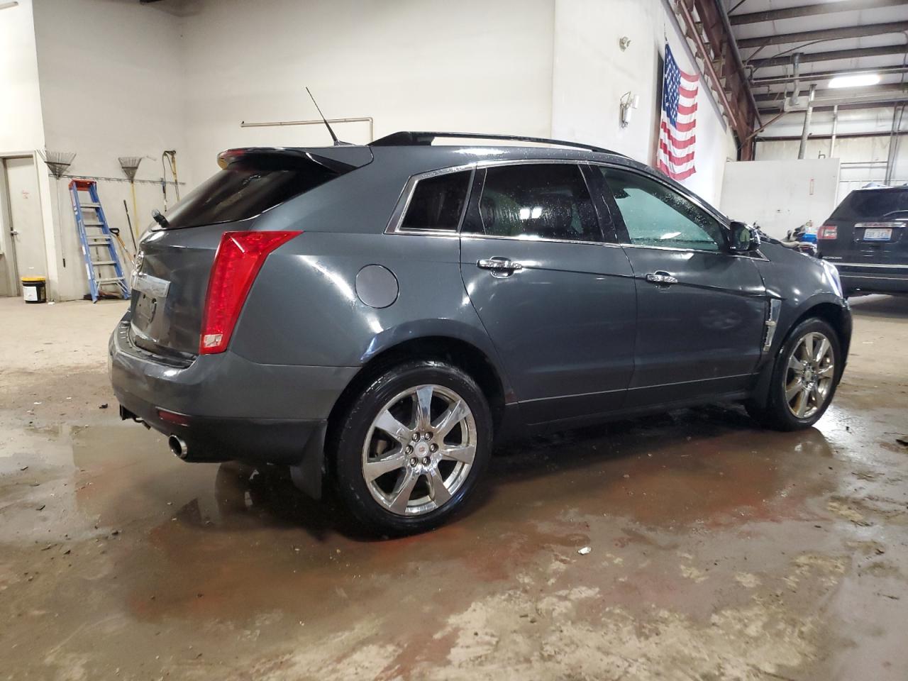 2010 Cadillac SRX VIN 3GYFNHEY5AS535094 Copart auction photo, side / mechanical damage thumbnail 3