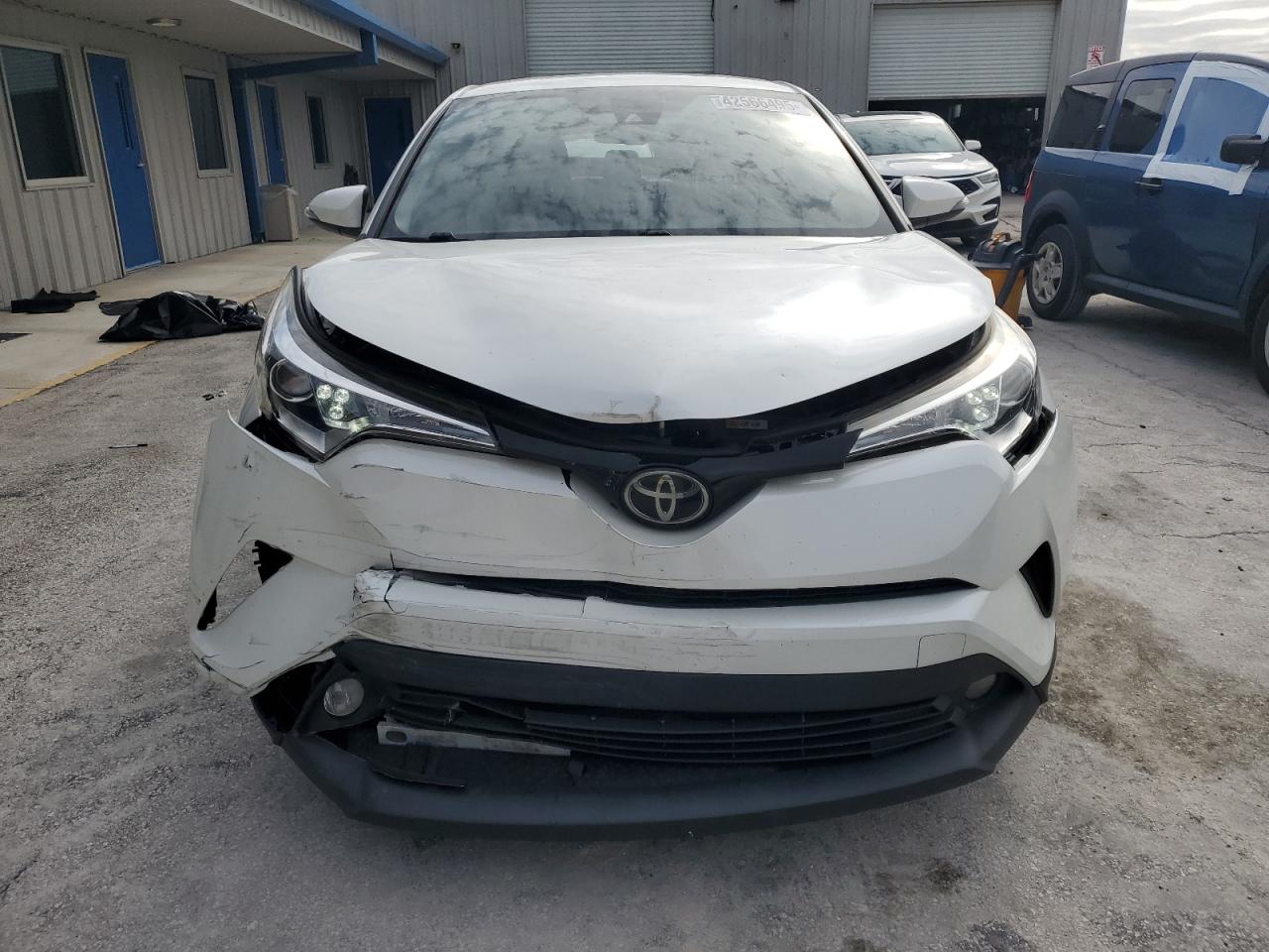 2019 Toyota C-HR VIN JTNKHMBX5K1016111 Copart auction photo, rear end / front end damage thumbnail 5