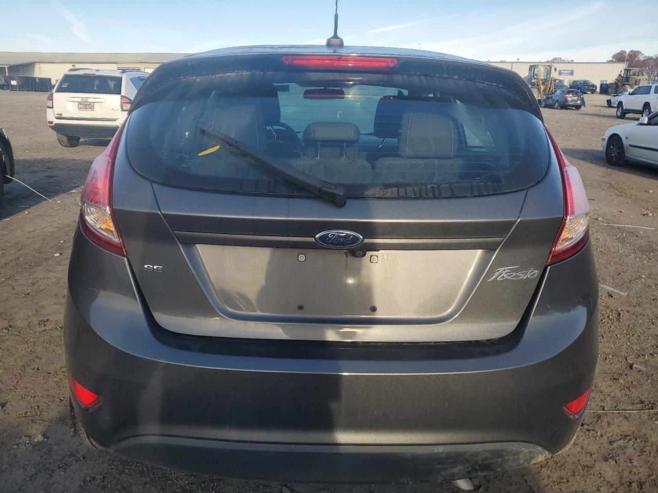 2018 Ford Fiesta VIN 3FADP4EJ4JM123763 Copart auction photo, side / minor dent/scratches damage thumbnail 6
