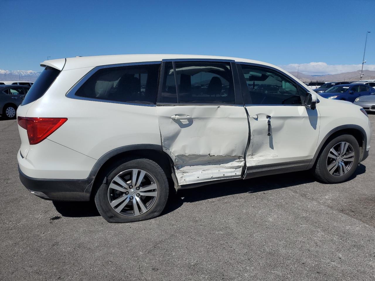 2016 Honda Pilot VIN 5FNYF5H43GB029560 Copart auction photo, side / rear end damage thumbnail 3
